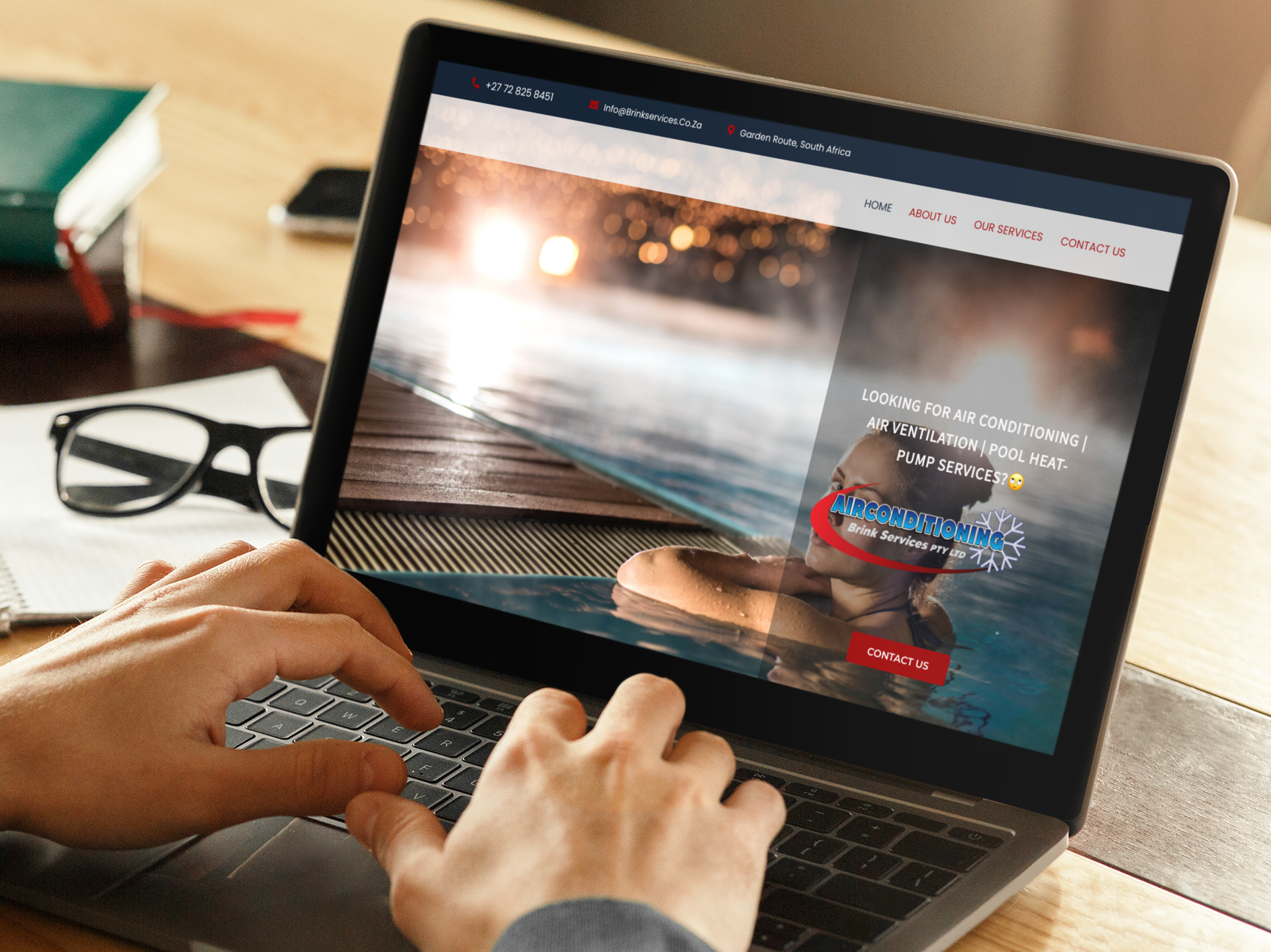 mockup-of-a-man-working-on-his-macbook-with-his-glasses-over-his-desk-m16994-r-el2